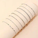 Pulseira Corrente Torcida Dourada – Kit com 11 Unidades Ajustáveis e Elegantes